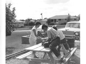 1963 July Mom, Dave, John painting table.jpg